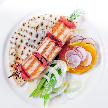 Rosemary skewered Huon Salmon with fennel, beans and flat bread