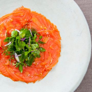 Huon Cold Smoked Ocean Trout ‘Carpaccio-style’ with torn herbs, lemon zest and pepper dressing